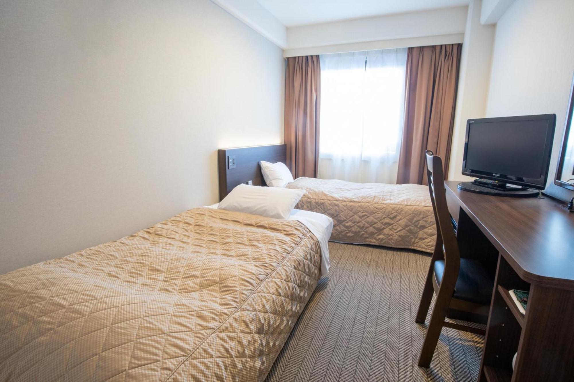Hotel Aisul Matsuyama Мацуяма Стая снимка